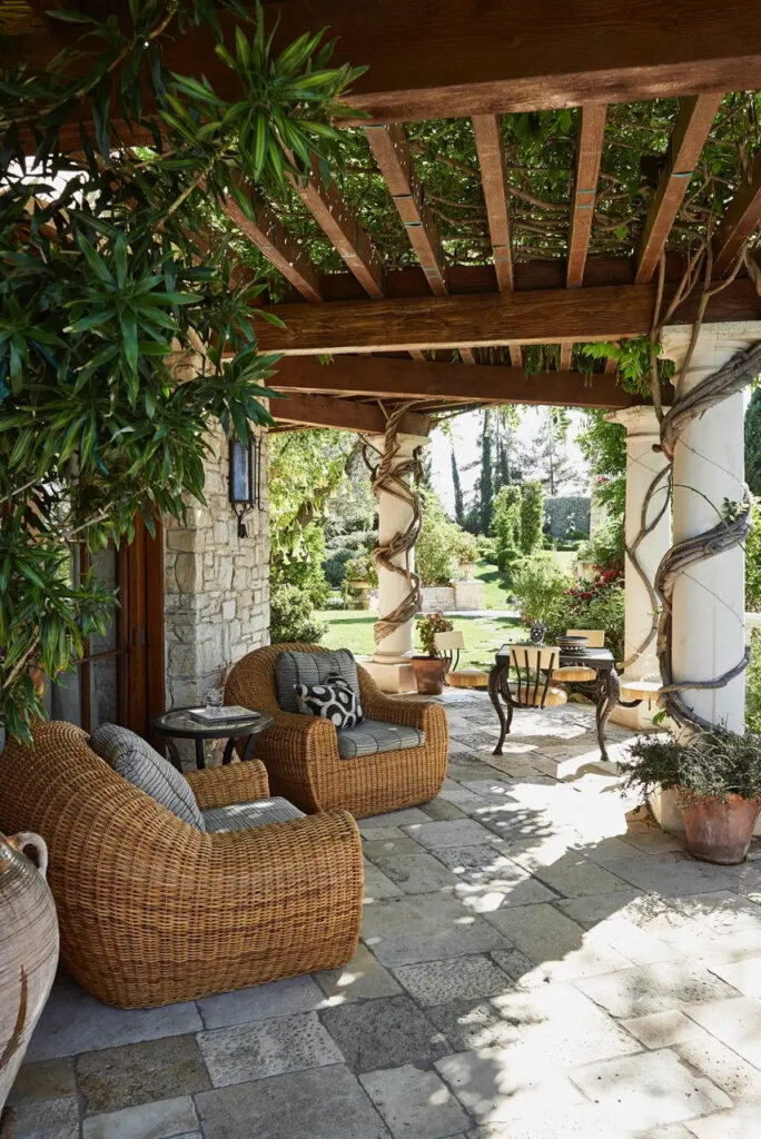 Mediterranean patio with artisan sitting